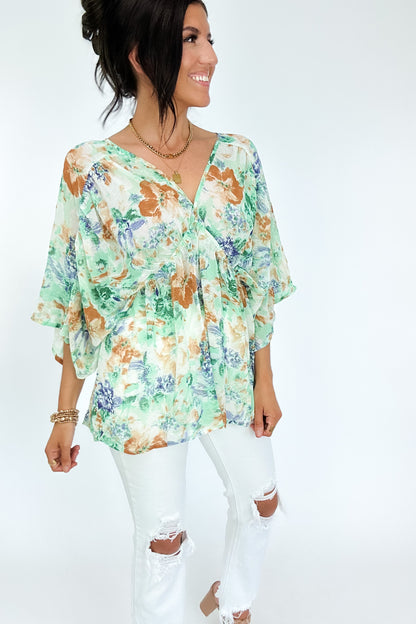 Fabled in Floral Draped Peplum Top in Ivory - WEBSITE EXCLUSIVE