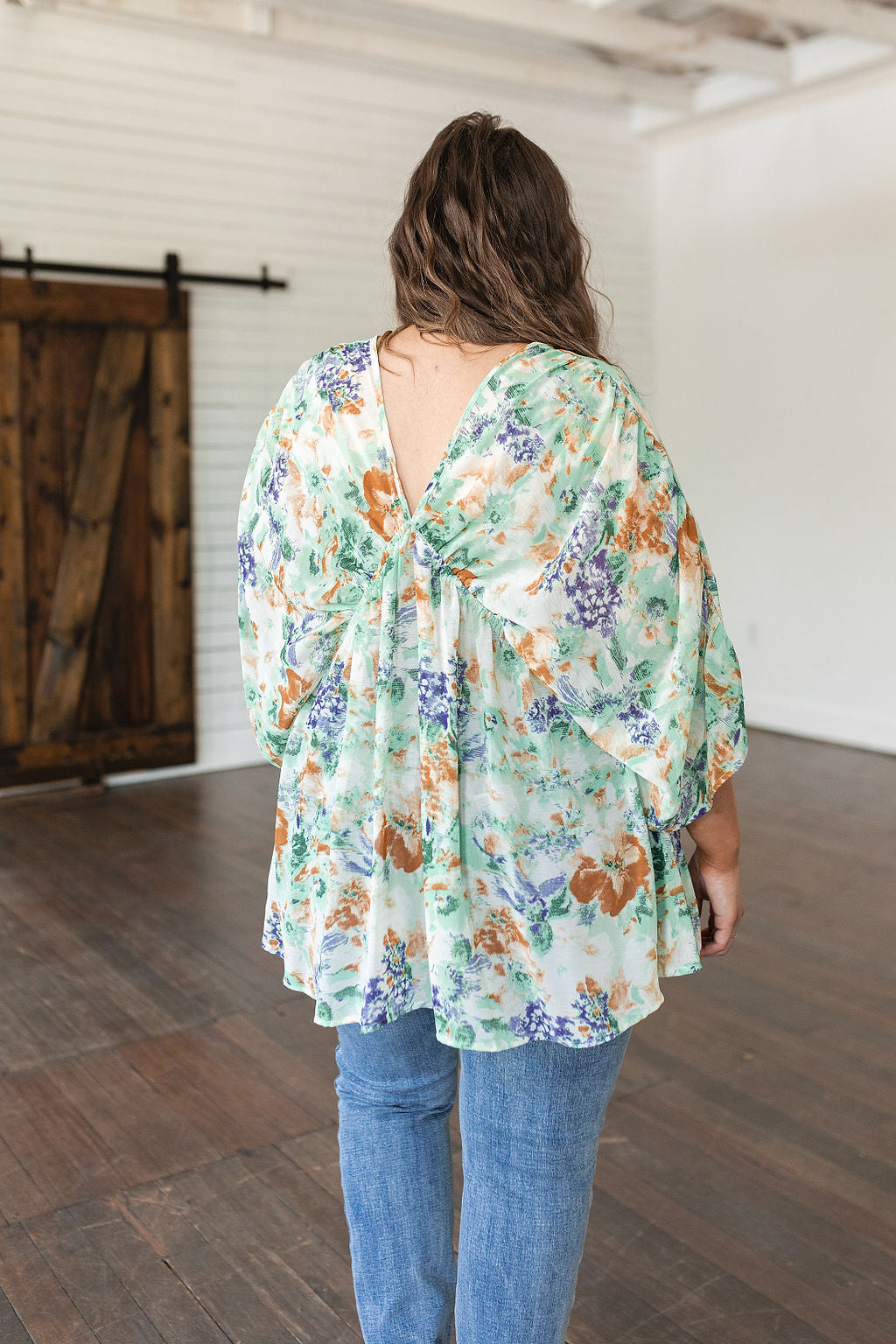 Fabled in Floral Draped Peplum Top in Ivory - WEBSITE EXCLUSIVE