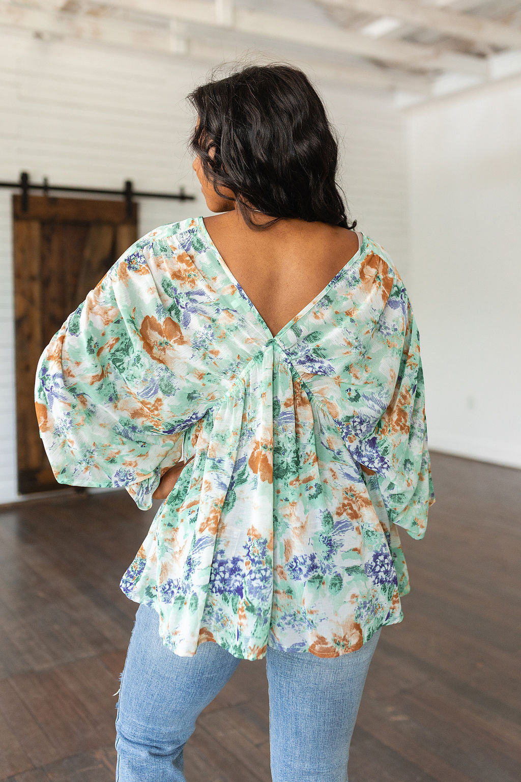 Fabled in Floral Draped Peplum Top in Ivory - WEBSITE EXCLUSIVE
