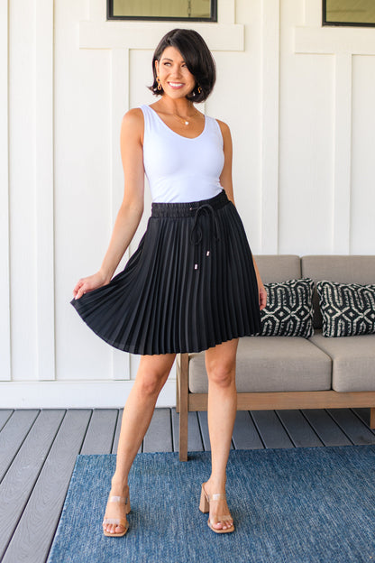 Just a Flirt Pleated Skirt in Black- WEBSITE EXCLUSIVE